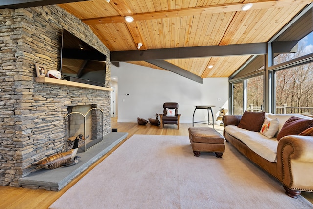 187 Sherbrook Dr, Goshen, CT 06756 - living room with wooden ceiling, wood finished floors, lofted ceiling with beams, a fireplace, and baseboards