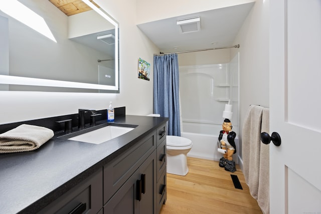 187 Sherbrook Dr, Goshen, CT 06756 - bathroom featuring toilet, vanity, shower / bath combo, and wood finished floors
