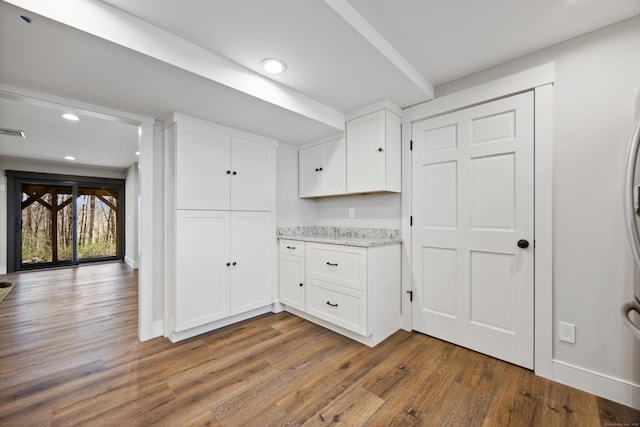 187 Sherbrook Dr, Goshen, CT 06756 - kitchen with baseboards, recessed lighting, light stone counters, white cabinets, and dark wood-style floors