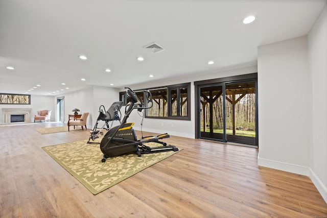 187 Sherbrook Dr, Goshen, CT 06756 - exercise room featuring baseboards, visible vents, wood finished floors, and recessed lighting
