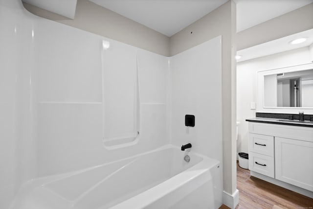 187 Sherbrook Dr, Goshen, CT 06756 - bathroom featuring vanity, washtub / shower combination, and wood finished floors