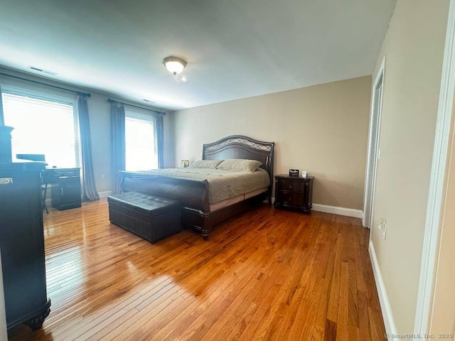 598 Nichols Ave, Stratford, CT 06614 - bedroom with baseboards, visible vents, and wood-type flooring