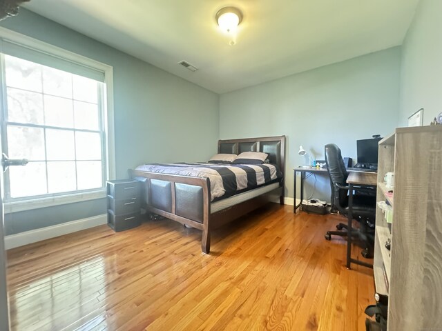598 Nichols Ave, Stratford, CT 06614 - bedroom featuring visible vents, multiple windows, and hardwood / wood-style flooring