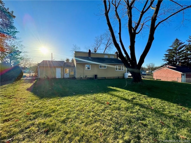 35 Marjorie Dr, North Branford, CT 06471 - back of property featuring a yard