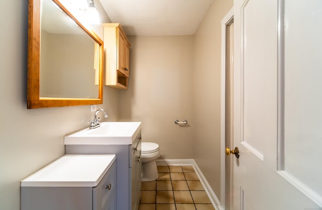22 Hooker Dr, West Hartford, CT 06107 - half bathroom with baseboards, tile patterned flooring, vanity, and toilet