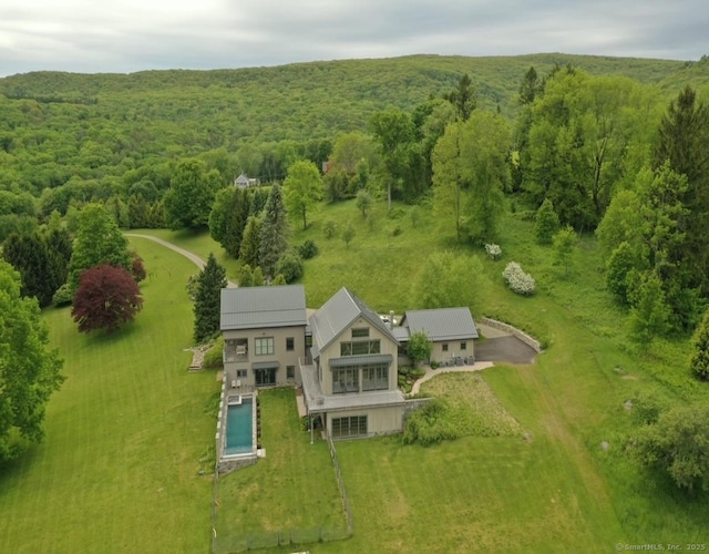 aerial view featuring a forest view