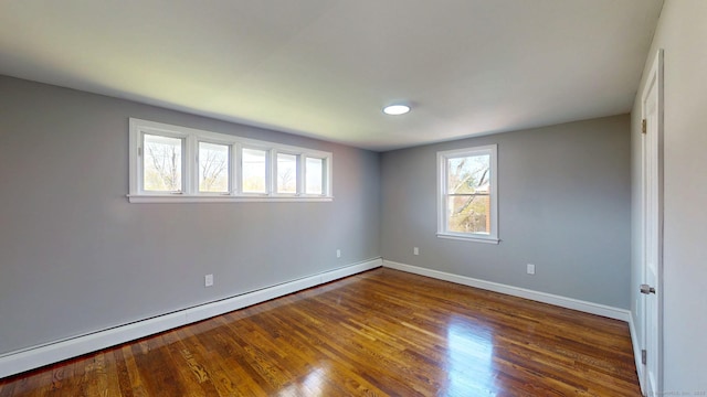 8 Batt St, Middletown, CT 06457 - spare room with a baseboard heating unit, wood finished floors, and baseboards