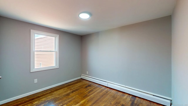 8 Batt St, Middletown, CT 06457 - spare room with baseboards, a baseboard heating unit, and dark wood finished floors