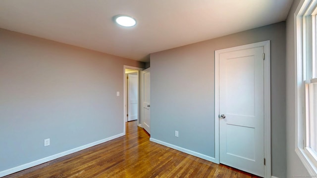 8 Batt St, Middletown, CT 06457 - unfurnished bedroom with wood finished floors and baseboards