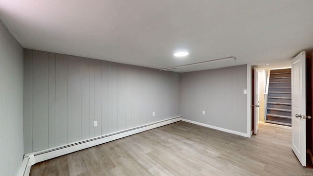 8 Batt St, Middletown, CT 06457 - unfurnished room featuring a baseboard radiator, wood finished floors, stairway, and baseboards
