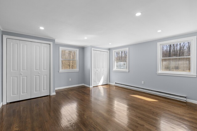 28 Shortwoods Rd, New Fairfield, CT 06812 - unfurnished bedroom featuring baseboards, recessed lighting, wood finished floors, two closets, and a baseboard radiator