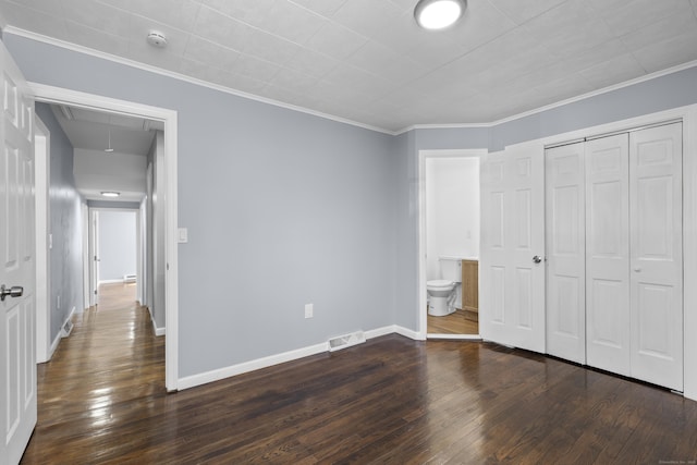 28 Shortwoods Rd, New Fairfield, CT 06812 - unfurnished bedroom with visible vents, a closet, baseboards, attic access, and dark wood-style flooring
