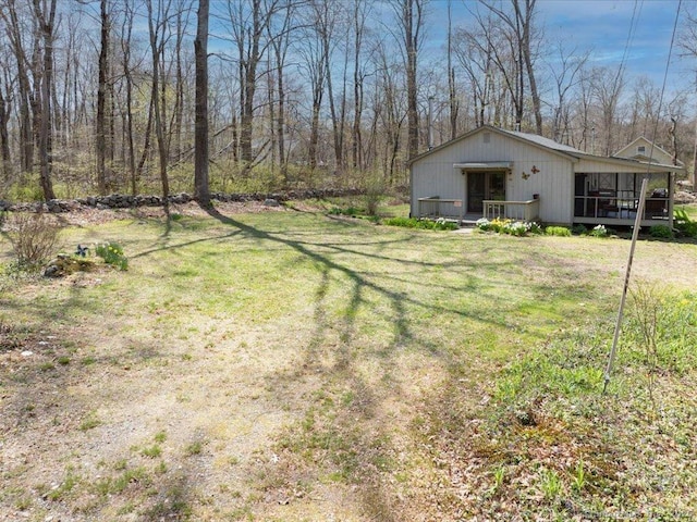 view of yard with a wooden deck