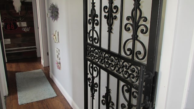 219 Forest St, East Hartford, CT 06118 - details featuring baseboards and wood finished floors