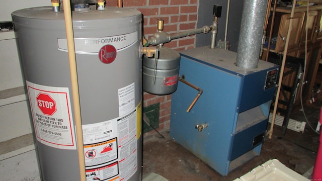 219 Forest St, East Hartford, CT 06118 - utility room with water heater and a heating unit