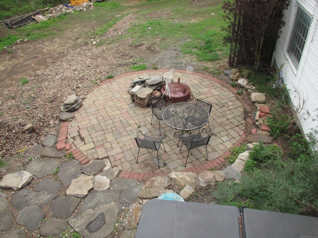 219 Forest St, East Hartford, CT 06118 - view of patio / terrace featuring a fire pit