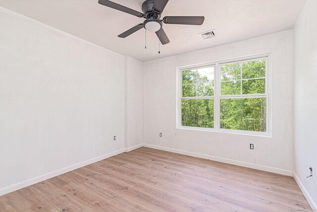 180 Tripp Hollow Rd, Brooklyn, CT 06234 - spare room with light wood-style flooring, baseboards, and ceiling fan