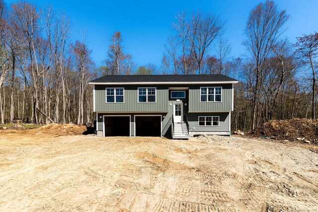 180 Tripp Hollow Rd, Brooklyn, CT 06234 - split foyer home featuring a garage