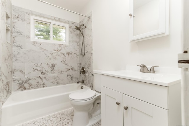 bathroom featuring shower / bathtub combination, toilet, and vanity