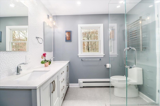 12 Winding Brook Ln, Redding, CT 06896 - bathroom featuring a baseboard radiator, double vanity, a stall shower, and recessed lighting
