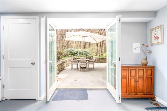 12 Winding Brook Ln, Redding, CT 06896 - doorway to outside featuring baseboards