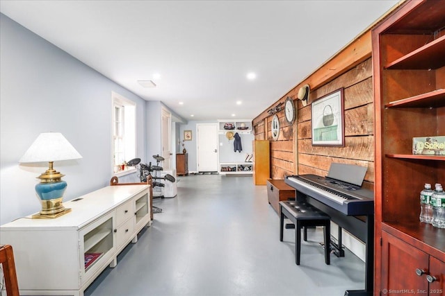 12 Winding Brook Ln, Redding, CT 06896 - sitting room with finished concrete floors and recessed lighting