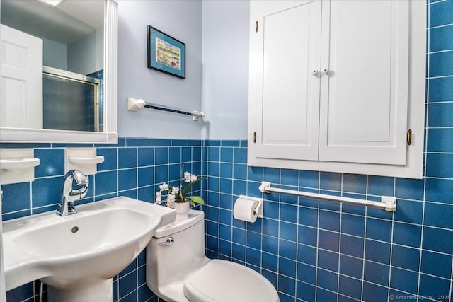 12 Winding Brook Ln, Redding, CT 06896 - full bath with a shower with shower door, tile walls, and wainscoting