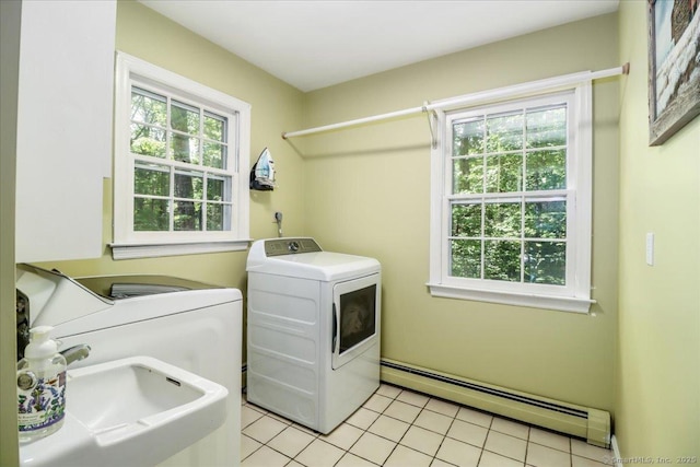 12 Winding Brook Ln, Redding, CT 06896 - laundry area featuring a baseboard radiator, washer and clothes dryer, and light tile patterned flooring