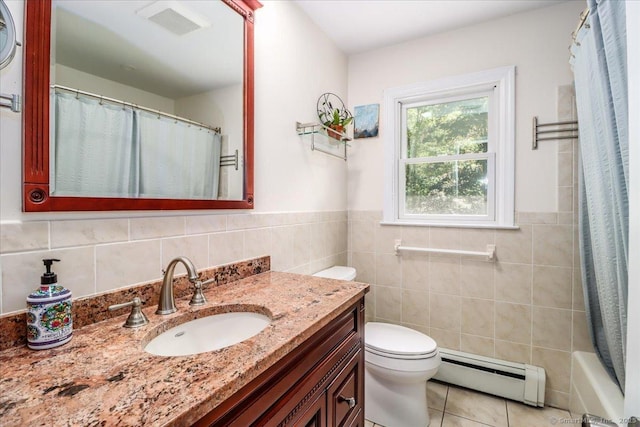 12 Winding Brook Ln, Redding, CT 06896 - full bath with baseboard heating, tile walls, tile patterned floors, vanity, and wainscoting