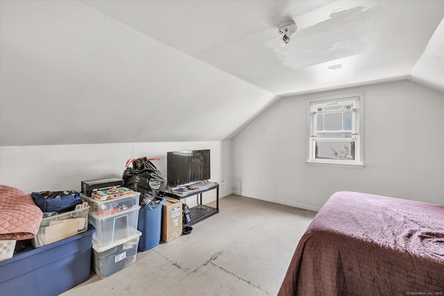 bedroom with lofted ceiling