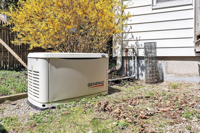 exterior details with a power unit and fence