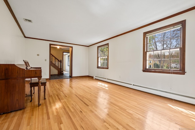 unfurnished living room featuring ornamental molding, baseboards, stairway, a baseboard radiator, and light wood finished floors