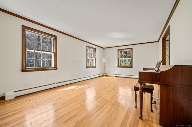 unfurnished living room with light wood-style floors, ornamental molding, and baseboard heating