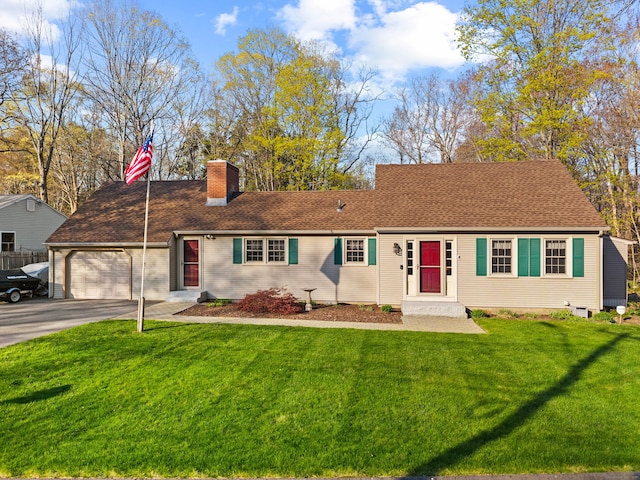 ranch-style house with a chimney, an attached garage, asphalt driveway, and a front lawn