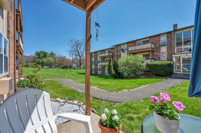 surrounding community with a lawn