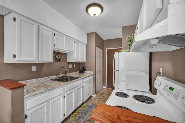 kitchen with white cabinets, white appliances, under cabinet range hood, and a sink