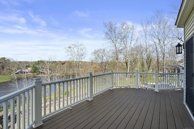wooden terrace with a water view