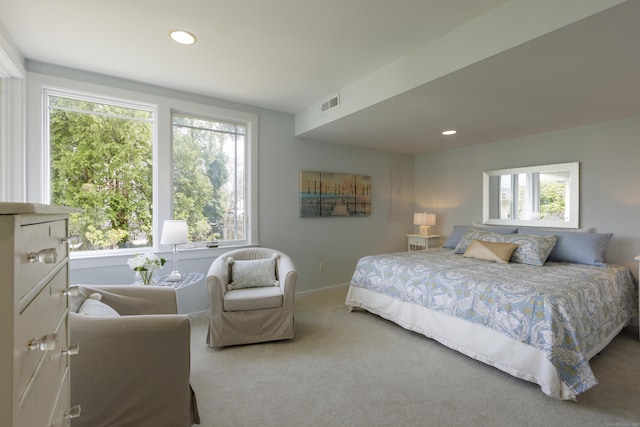carpeted bedroom featuring visible vents, recessed lighting, and baseboards
