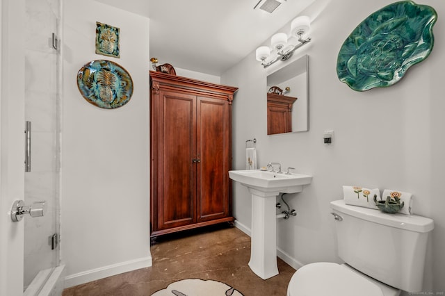 full bathroom with walk in shower, toilet, baseboards, and visible vents