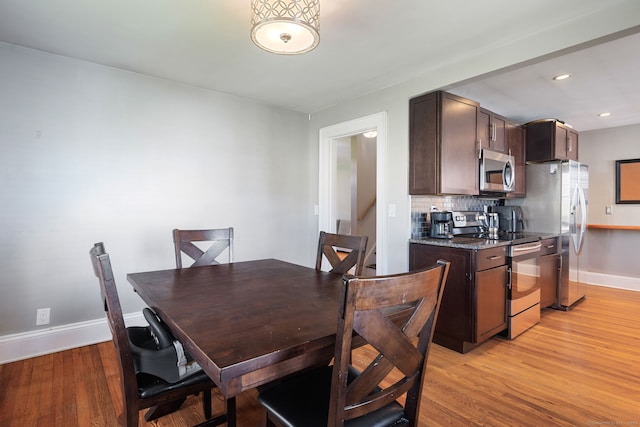 43 Bibbins Ave, Fairfield, CT 06825 - dining space with baseboards, recessed lighting, and light wood-style flooring