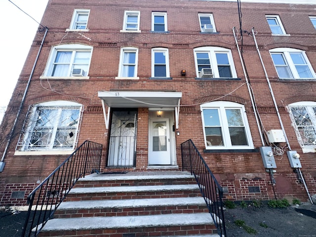 65 Beach St, Bridgeport, CT 06608 - multi unit property with brick siding and cooling unit