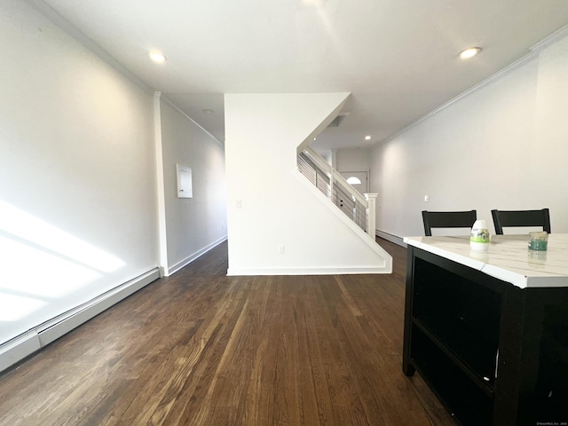 65 Beach St, Bridgeport, CT 06608 - unfurnished living room featuring baseboard heating, wood finished floors, stairs, and crown molding