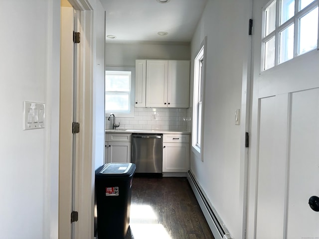 65 Beach St, Bridgeport, CT 06608 - kitchen featuring light countertops, stainless steel dishwasher, a sink, dark wood-type flooring, and a baseboard radiator