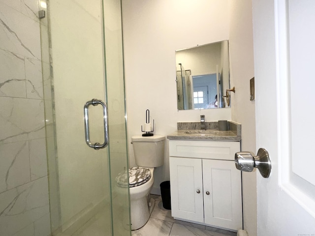 65 Beach St, Bridgeport, CT 06608 - bathroom featuring vanity, marble finish floor, a stall shower, and toilet