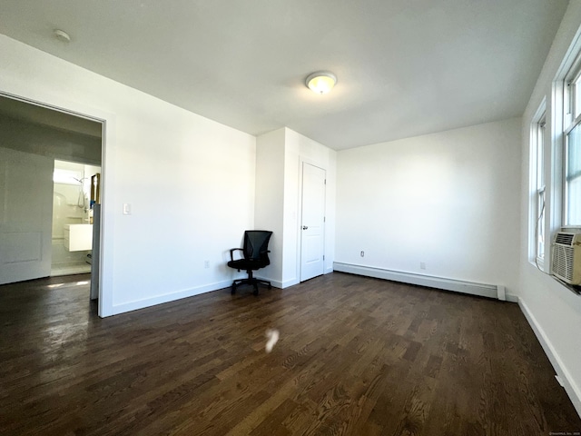 65 Beach St, Bridgeport, CT 06608 - unfurnished room featuring baseboards, dark wood-style floors, and a baseboard radiator