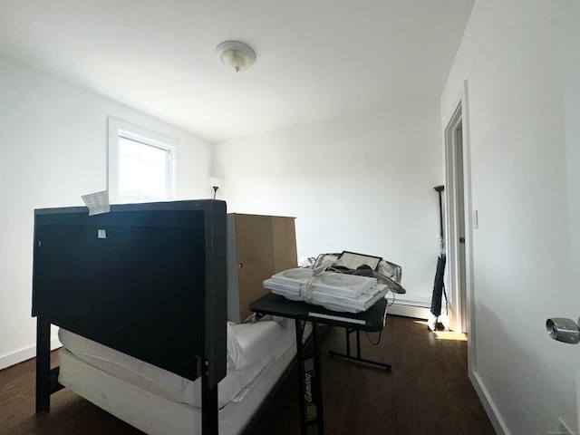 65 Beach St, Bridgeport, CT 06608 - misc room featuring a baseboard radiator, baseboards, and wood finished floors
