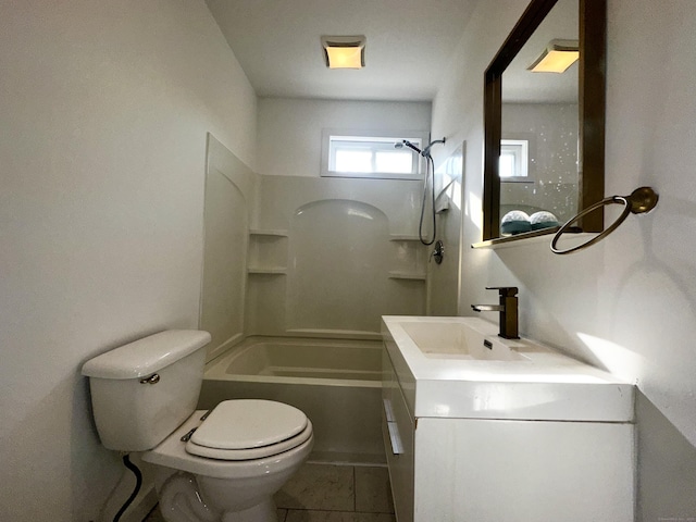 65 Beach St, Bridgeport, CT 06608 - bathroom with bathing tub / shower combination, vanity, tile patterned flooring, and toilet