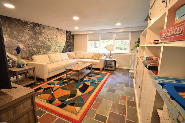12 W Point Rd, East Hampton, CT 06424 - living area featuring recessed lighting, baseboards, an accent wall, and stone tile flooring