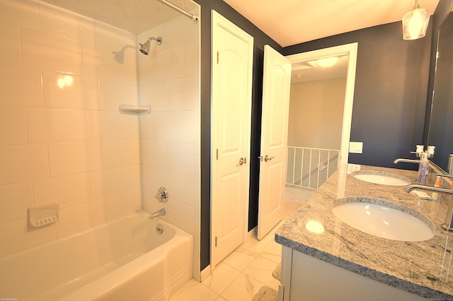 12 W Point Rd, East Hampton, CT 06424 - full bath featuring double vanity, a sink, marble finish floor, and washtub / shower combination