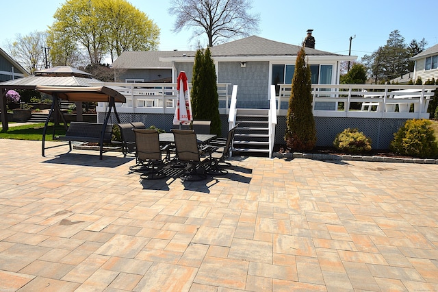 12 W Point Rd, East Hampton, CT 06424 - view of patio featuring outdoor dining area, a wooden deck, and a gazebo